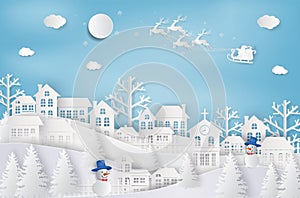 Merry Christmas and Happy New Year. Santa Claus on the sky coming to City. with winter landscape with snowflakes, light, stars. M