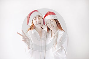 Merry Christmas and happy new year. Two women
