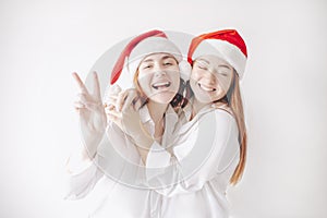 Merry Christmas and happy new year. Two women