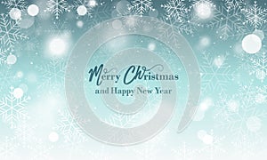 Merry Christmas and Happy New Year wishes. Blurred background with snowflakes and glowing elements.