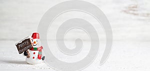 Merry Christmas and Happy new years Snowman web banner with copy space