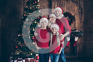 Merry christmas and happy newyear.Photo of daddy mommy sister brother having best x-mas eve together near garland tree