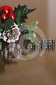 Merry christmas letters with christmas decorations for background