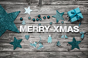 Merry christmas letters in white with turquoise decoration for a