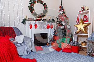 Merry Christmas living room interior with decorated fir-tree, fireplace, wreath, star, cones, bulbs, gift boxes and red plaid