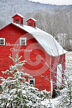Merry christmas red barn in snow