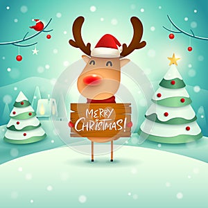 Merry Christmas! The red-nosed reindeer holds wooden board sign in Christmas snow scene winter landscape.