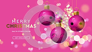 Merry Christmas sale banner with pink colorful baubles sparkle in blur bokeh effect pink background.