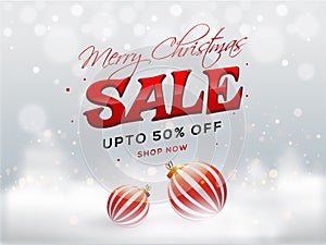 Merry Christmas Sale banner or poster design with 50% discount offer and baubles.