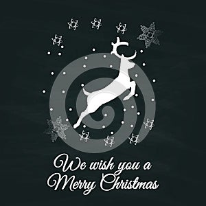 Merry Christmas sign vintage sketch style with deer at grunge chalkboard