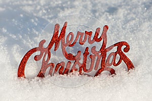 Merry Christmas sign in winter snow