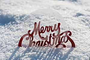 Merry Christmas sign in winter snow