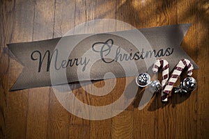 Merry Christmas Sign on Wood Background