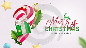 Merry christmas text vector design. Christmas candy cane and gift box ornaments decoration