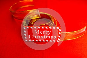 Merry Christmas text wooden sign, decorations and ornaments in a colorful Christmas composition