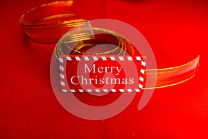 Merry Christmas text wooden sign, decorations and ornaments in a colorful Christmas composition