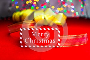 Merry Christmas text wooden sign, decorations and ornaments in a colorful Christmas composition