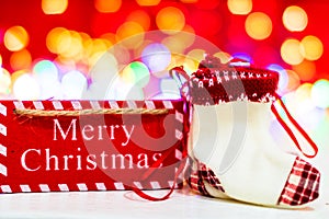 Merry Christmas text wooden sign, decorations and ornaments in a colorful Christmas composition