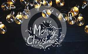 Merry Christmas Typography Light Bulbs on Black Wood