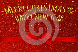 Merry Christmas word on red glitter texture abstract background