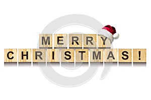 Merry Christmas. Words made up of alphabet on wooden cubes. White background. Isolated.