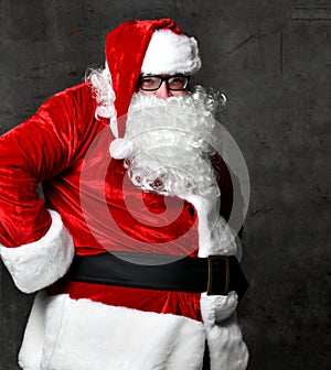 Merry fat Santa Claus is looking at us asking if we had behaved well this year. New year and Merry Christmas