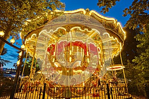 Merry go round carousel childhood entertainment. Vintage playground attraction