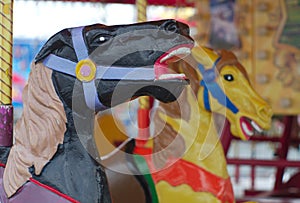 Merry-go-round carrousel antique horses painted colors