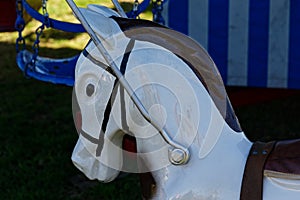 A merry go round horse at a fair