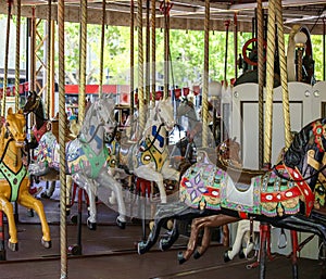 Merry-go-round with horses. Carousel with horses.