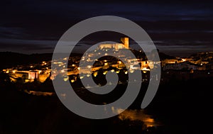 Mertola castle, town and river at night