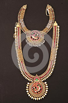 merwara necklace combo gold-plated matte finish and pota stones. green red pink and white.