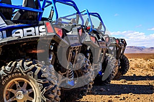 Merzouga, Morocco - Feb 21, 2016: Close-up of wheel of Blue Polaris RZR 800