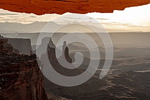 Mesa Arch Overhangs A View of The Washer Woman and The La Sal Mountains