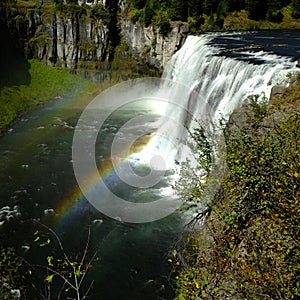 Mesa Falls Waterfall Water Fall Ruged Canyon with Mist and Rainbows