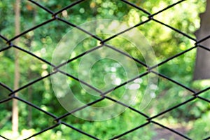 Mesh chain-link background and texture. Iron cover outdoor area.