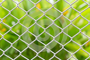 Mesh fence closeup on blur backgroun
