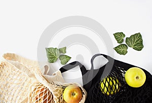 Mesh Shopping Bag With Green Apples on white background. Zero waste shopping concept.