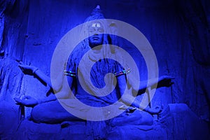 Mesmerising sculpture of Lord Shiva meditating in a blue light during Ganpati Festival, Pune