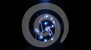 Abstract human form illuminated by glowing blue lights in darkness