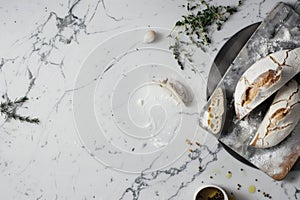 A mesmerizing display of various foods arranged on a luxurious marble countertop in a kitchen setting