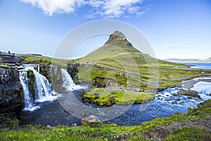 Mesmerizing shot of the famous Kirkjufellsfoss mountain and Barnafoss river in Iceland