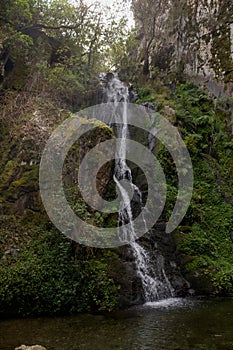 Mesmerizing shot of the Fraga da Pena waterfall in Portugal photo