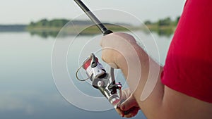 The mesmerizing spin of the reel that the fisherman spins while retrieving fish.