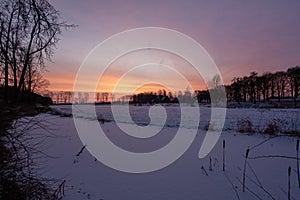 Mesmerizing sunset near the historic Doorwerth castle during winter in Holland