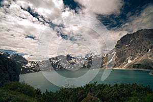 Mesmerizing view of Lunersee lake in between mountains in Austria