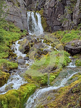 Mesmerizing view of a waterfall in Seydisfjordur, Iceland