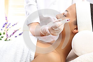 Mesotherapy microneedle, the woman at the beautician