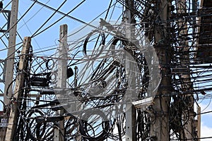 A mess of power poles and wires, cabling systems, and internet towers are dangerous.