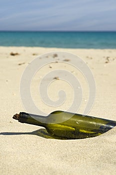 Message in bottle on beach